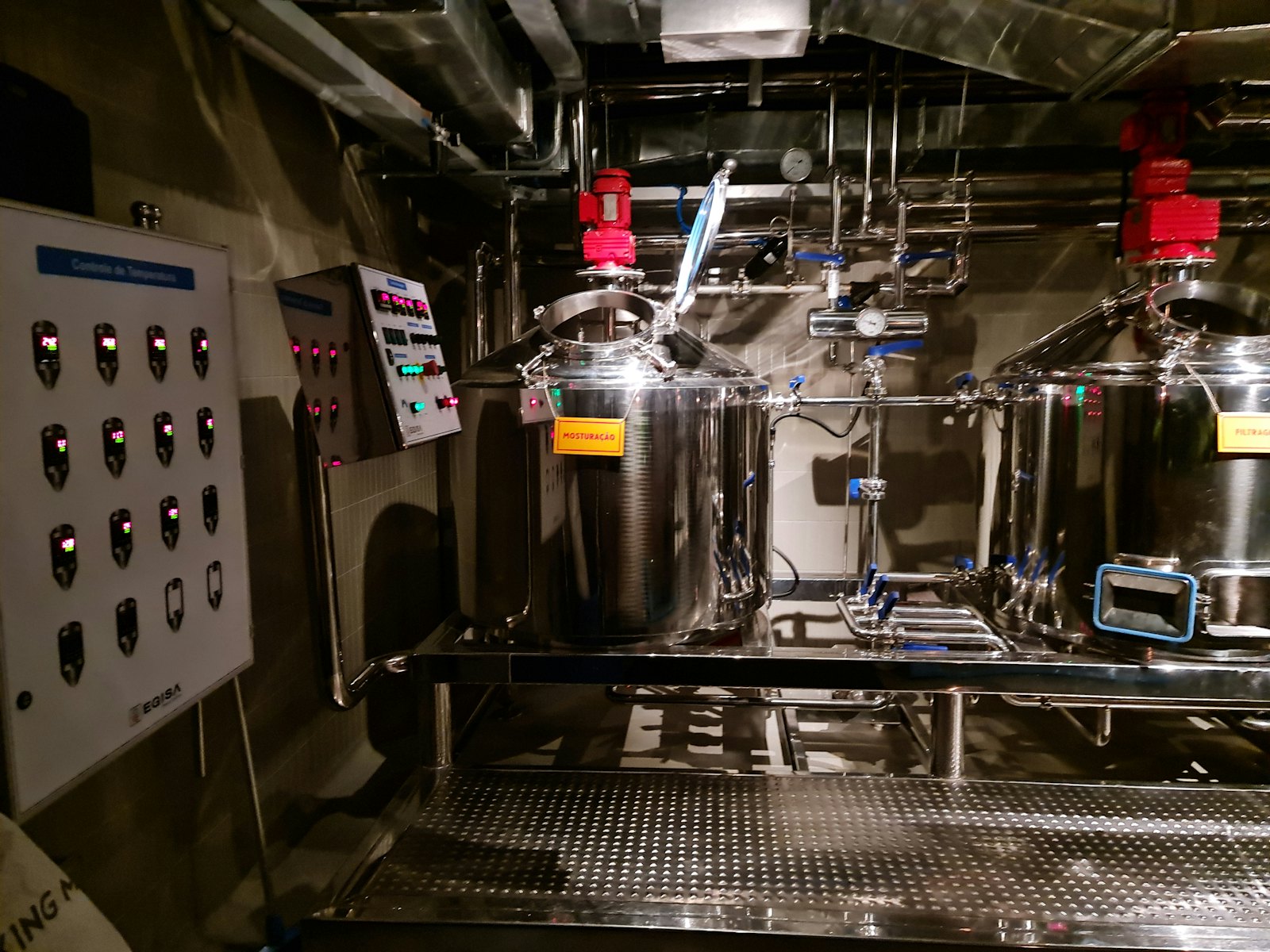 Stainless mixing vessels with agitators and a control panel